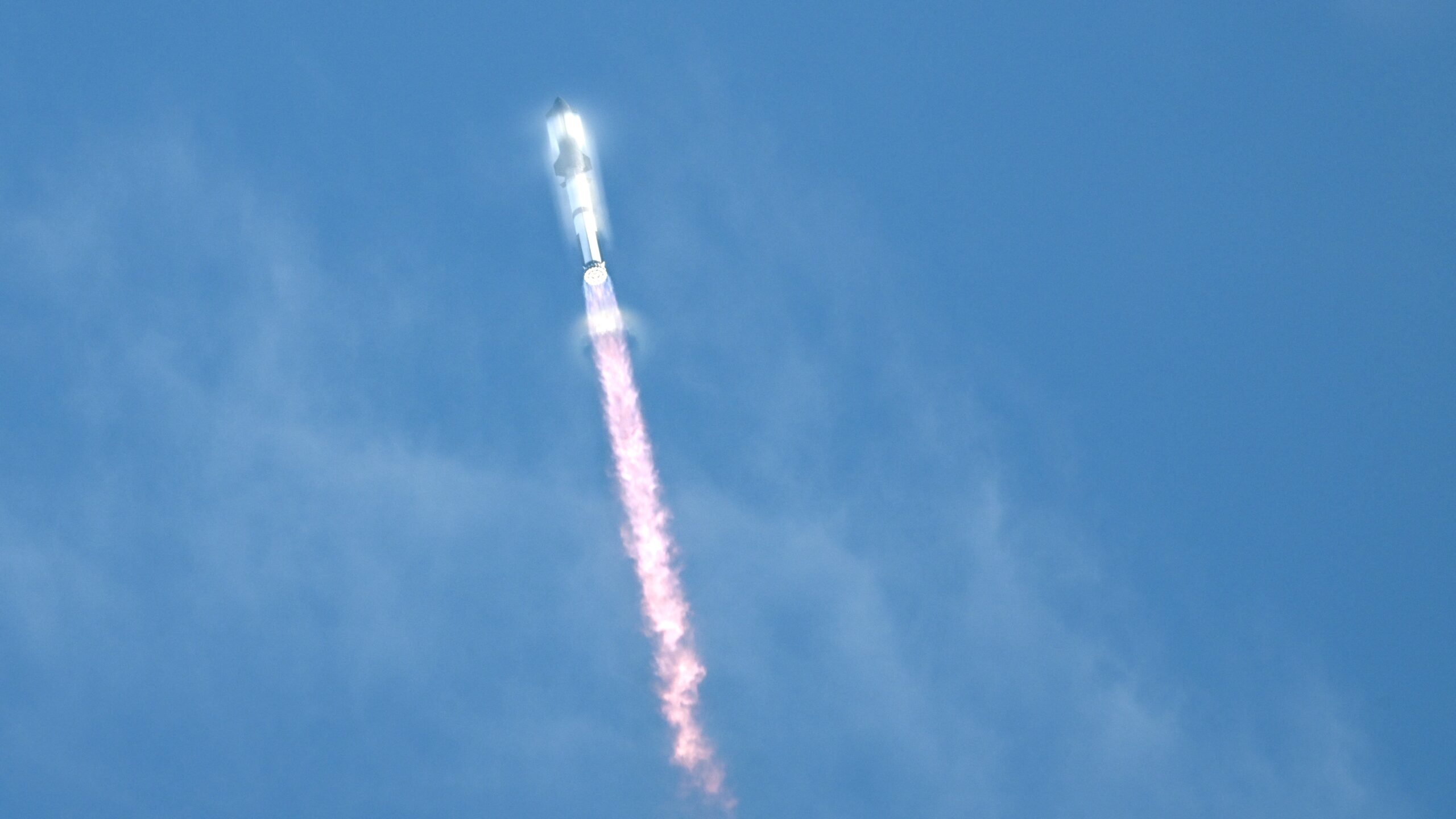 SpaceX's Starship lifting off from Starbase, Texas, as seen from South Padre Island on August 26, 2025.