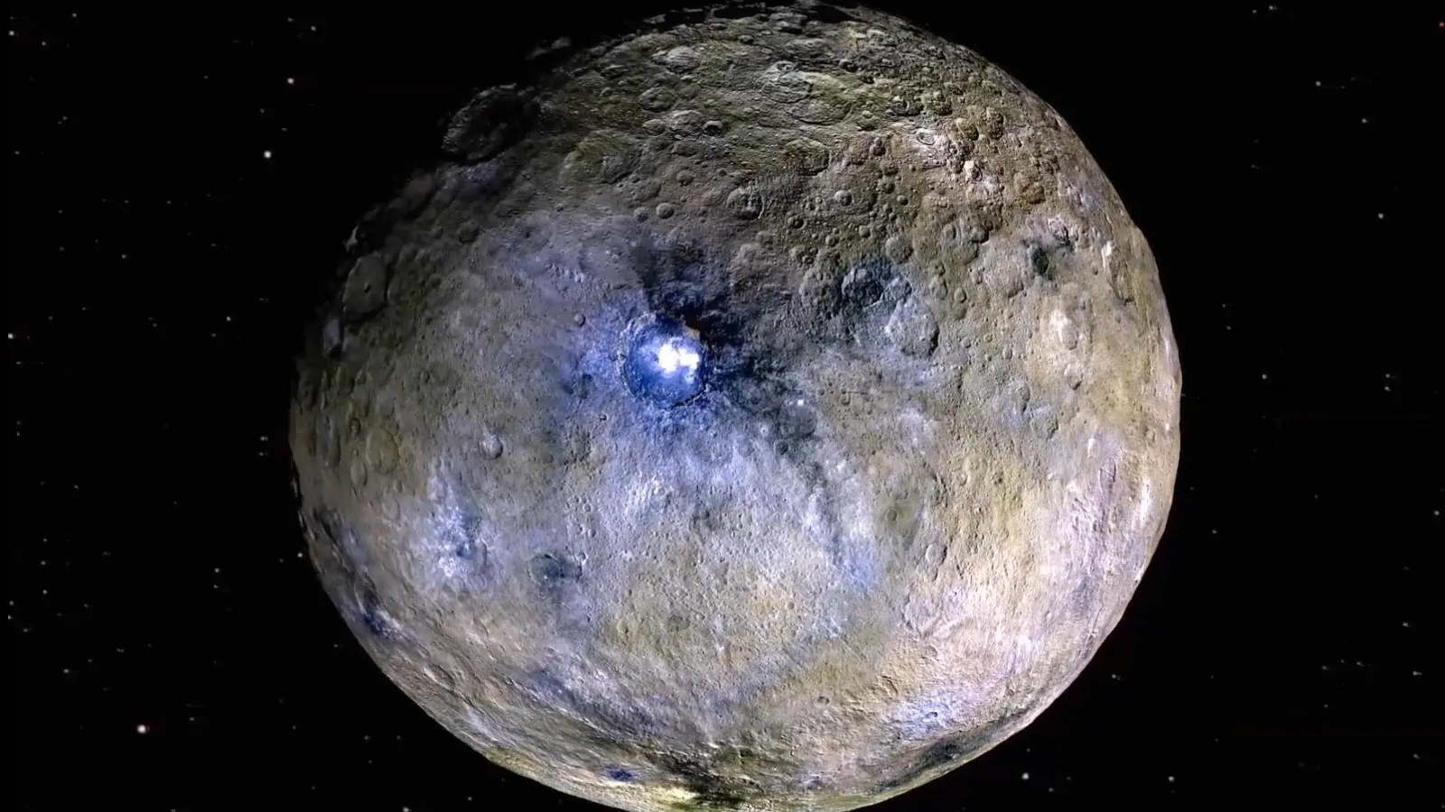 Une image de Ceres dans l'espace avec une source d'énergie rougeoyante en son centre