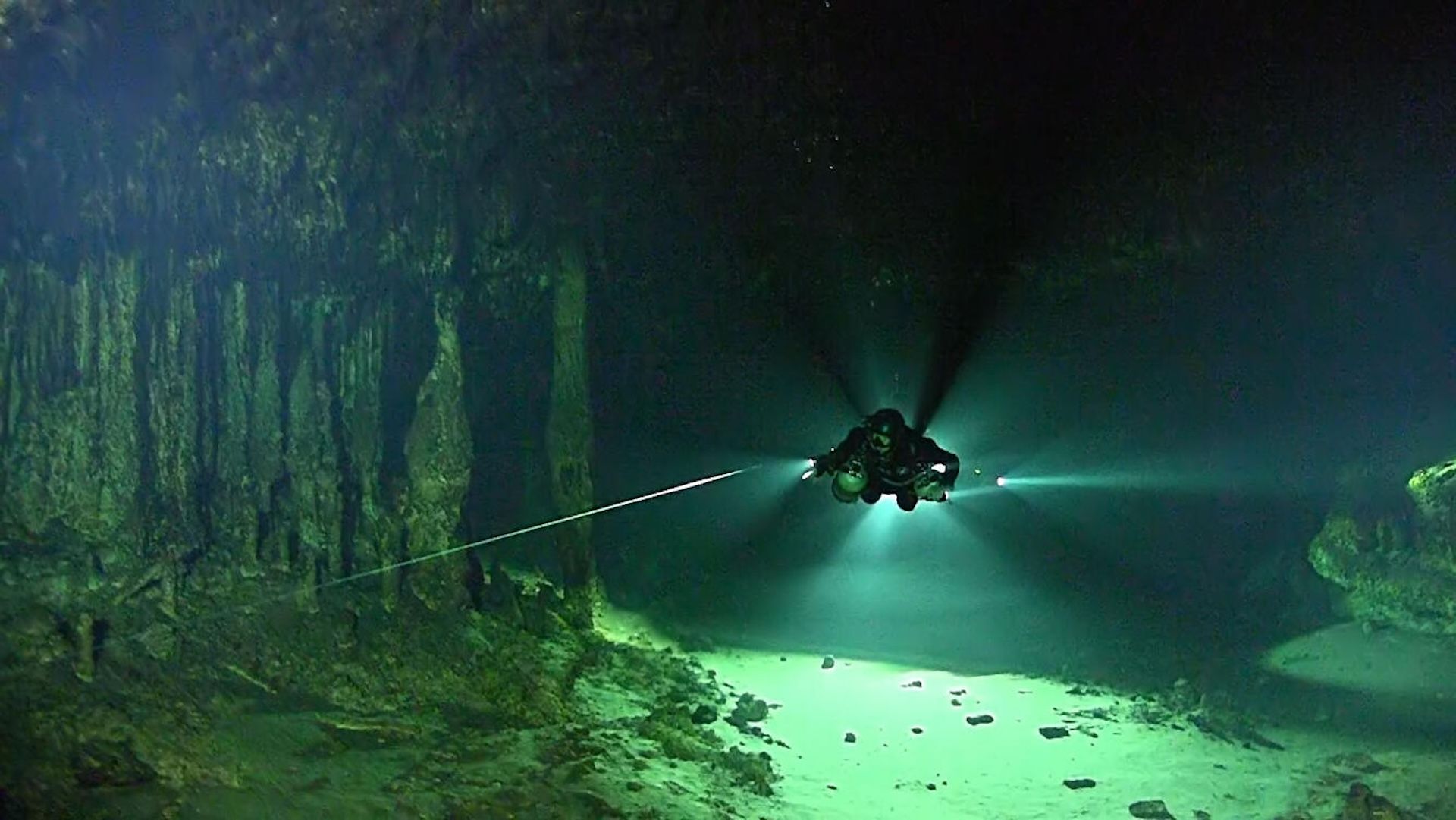 A photo of an underwater cave diver