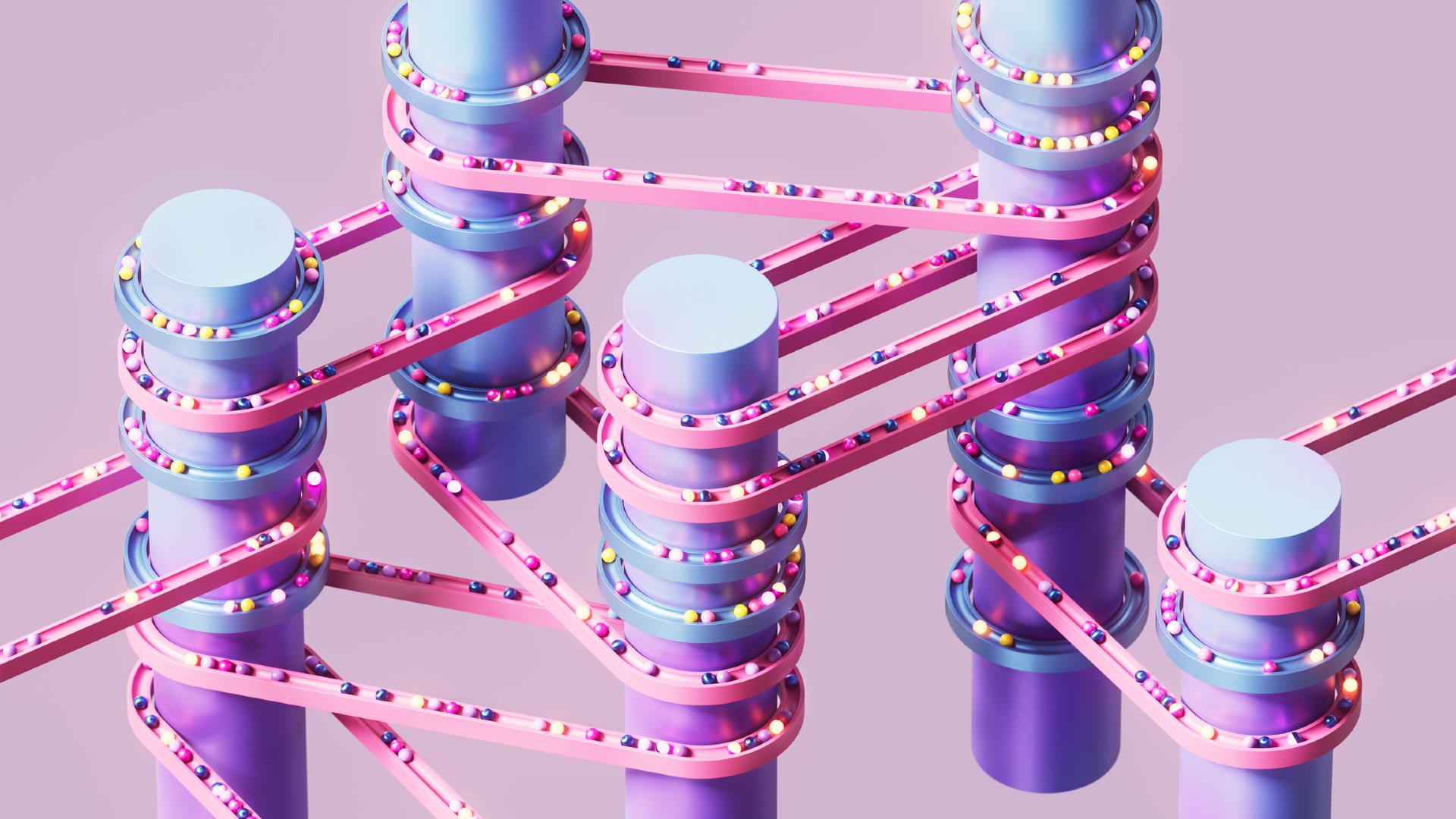 Une série de cylindres verticaux violets enveloppés de bandes roses et bleues avec des boules de différentes couleurs se déplaçant dessus