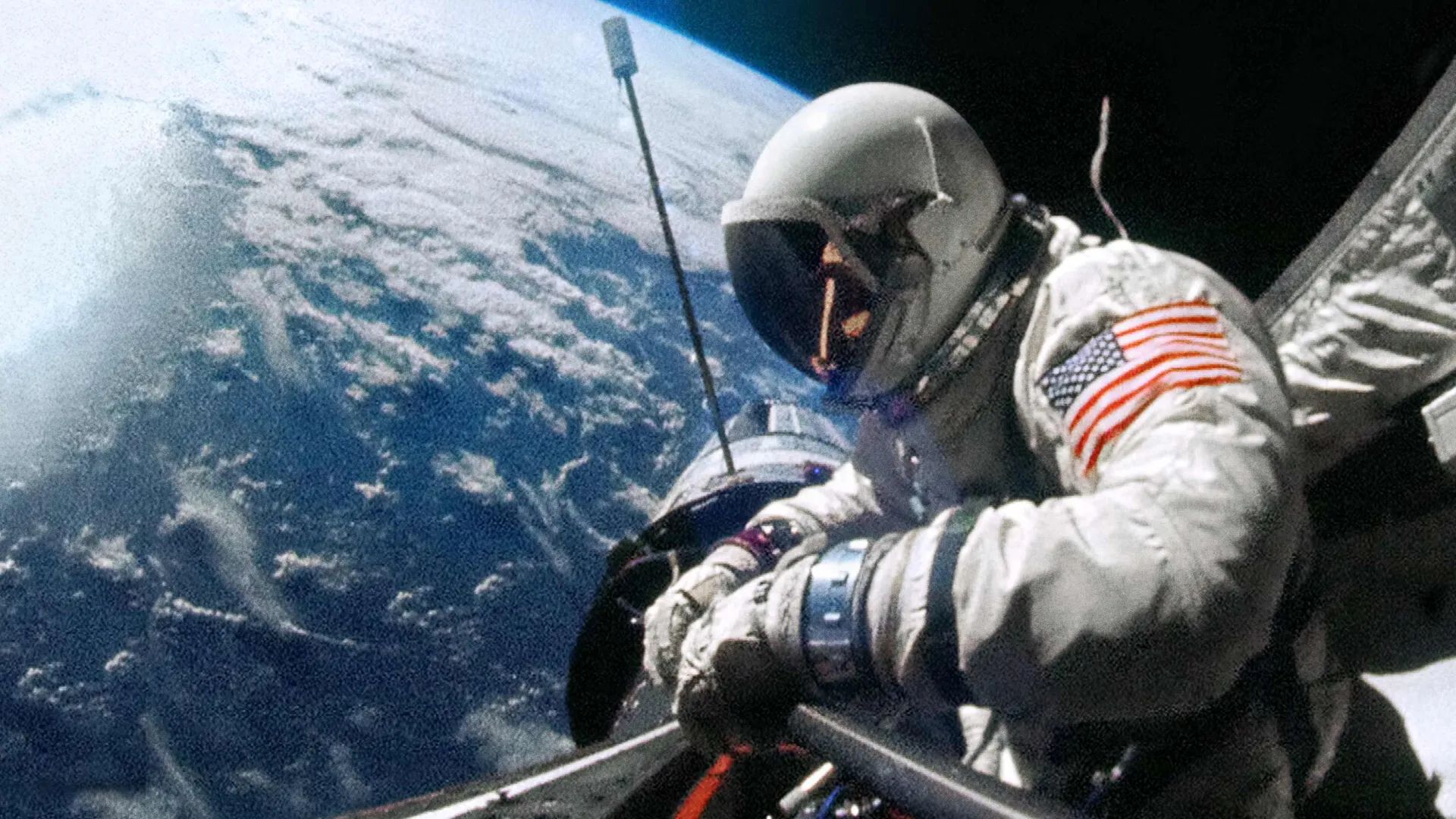 Image of an astronaut performing a spacewalk above Earth in Paramount+ documentary "Space Voyages"