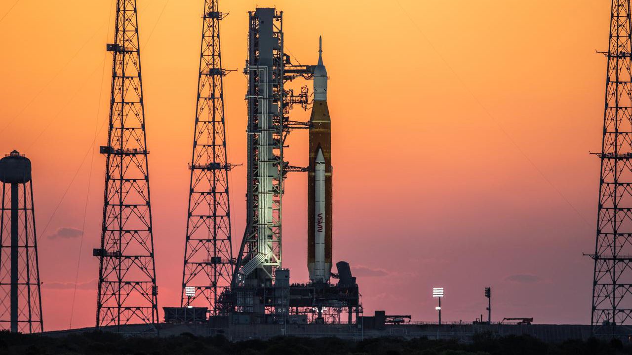 The sunrise casts a warm glow around the Artemis I Space Launch System (SLS) and Orion spacecraft at Launch Pad 39B at NASA’s Kennedy Space Center in Florida on March 21.