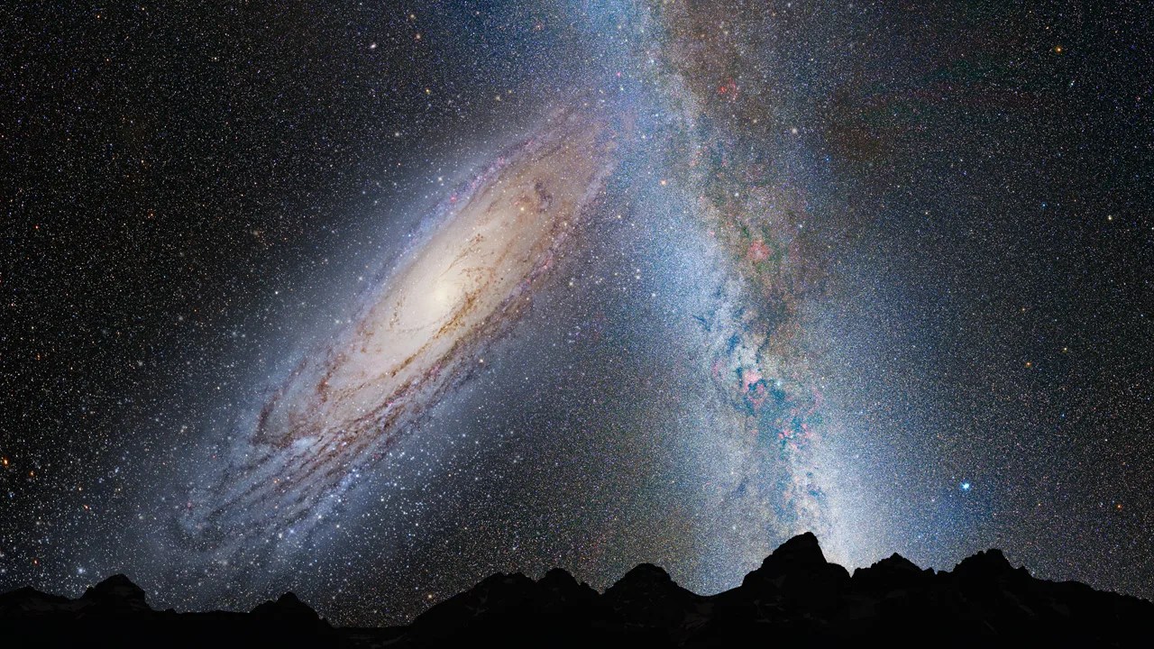 Illustration du ciel nocturne sur un horizon sombre et montagneux. Le ciel montre une grande galaxie spirale inclinée à gauche et un nuage d'étoiles blanc laiteux traverse le ciel verticalement à droite. 
