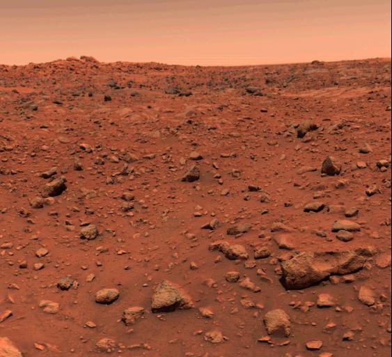 Une image montrant la surface rougeâtre/brune de Mars