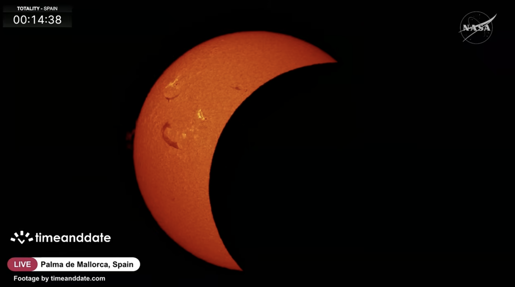 Une vue de la phase partielle de l'éclipse au-dessus de l'Espagne, gracieuseté de timeanddate.com et du livestream de la NASA