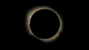 The sun looks like a white diamond ring behind the moon in this total solar eclipse image