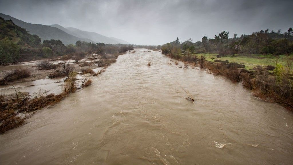 A bulging river in California after heavy rainfall.