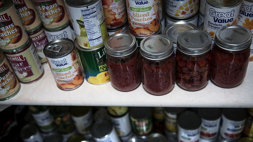 A stocked shelf in a food pantry.