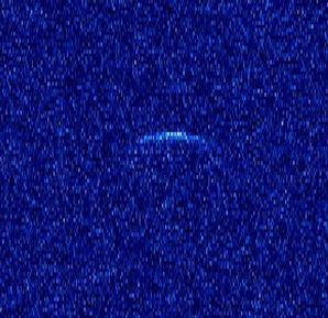 Une image étoilée bleue avec un flou au milieu