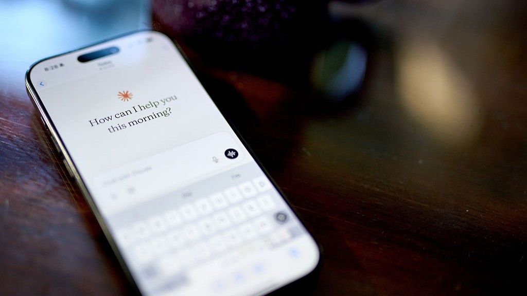 A smartphone screen with the AI chatbot Claude prompting the user to start a conversation.