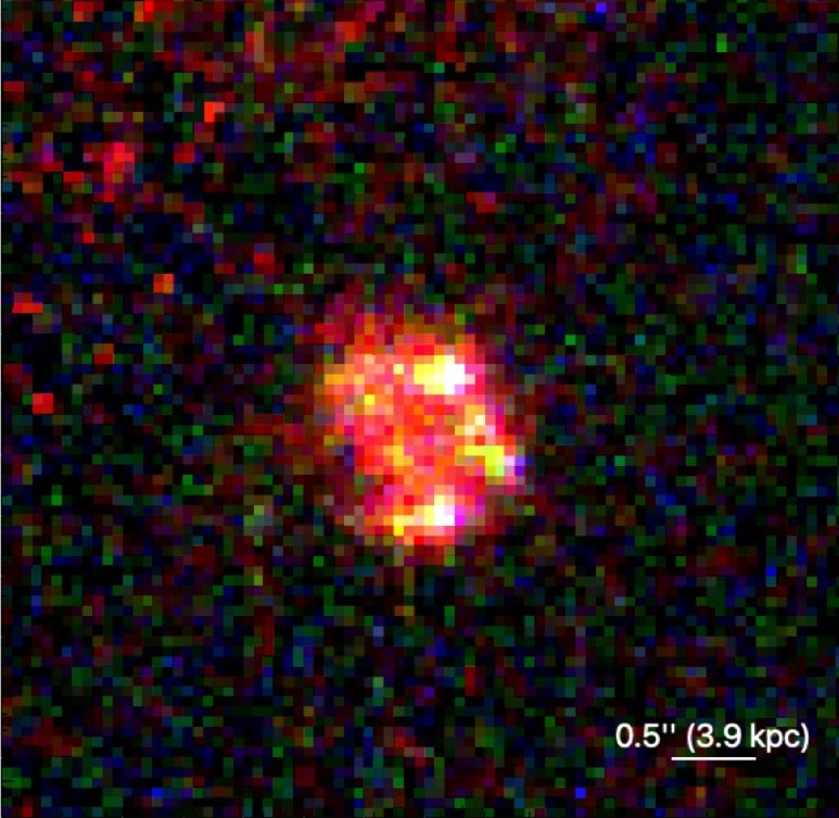 Une carte thermique montrant une boule de lumière rougeoyante dans l’espace lointain