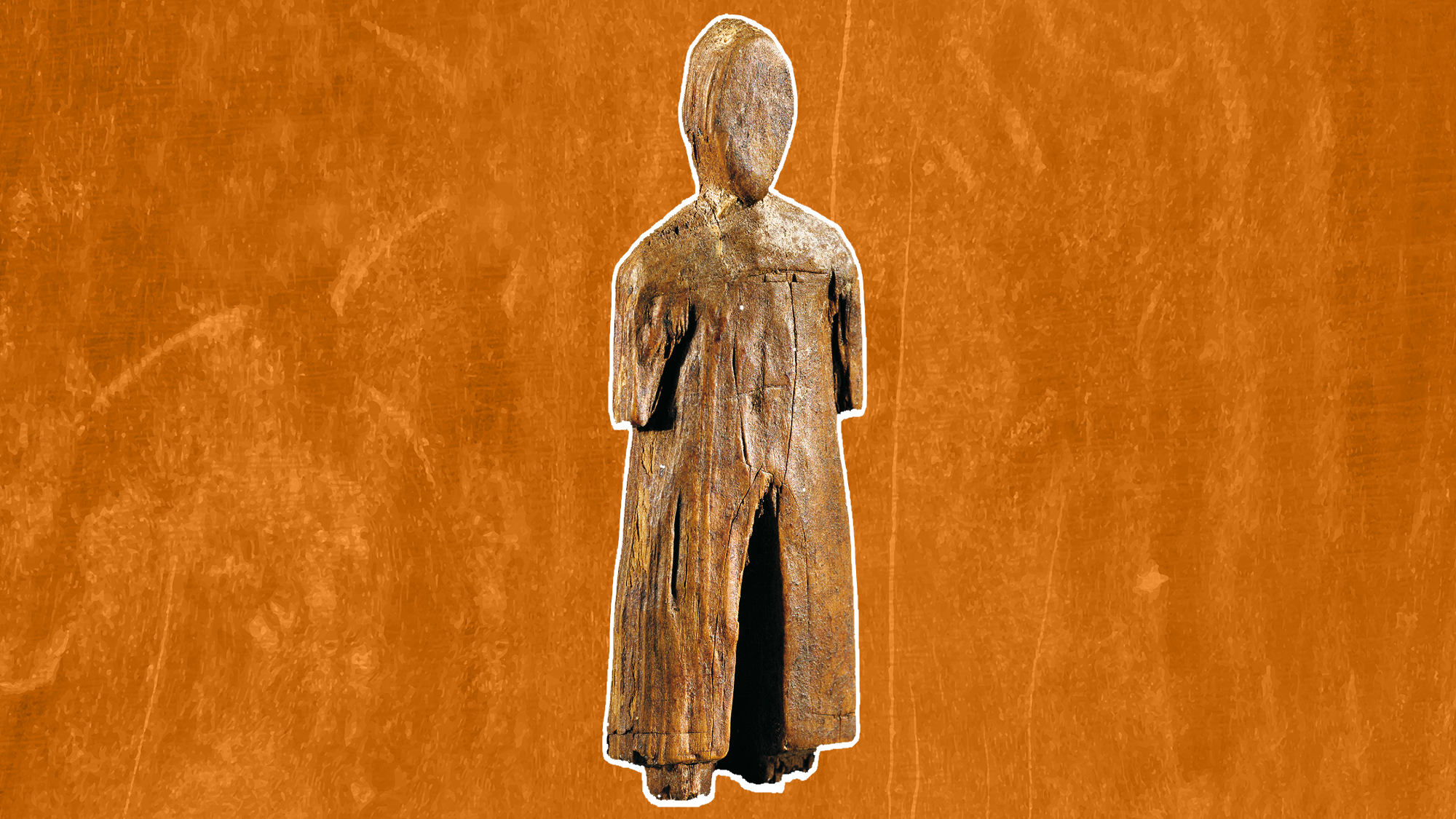 une figurine humaine en bois sur fond orange